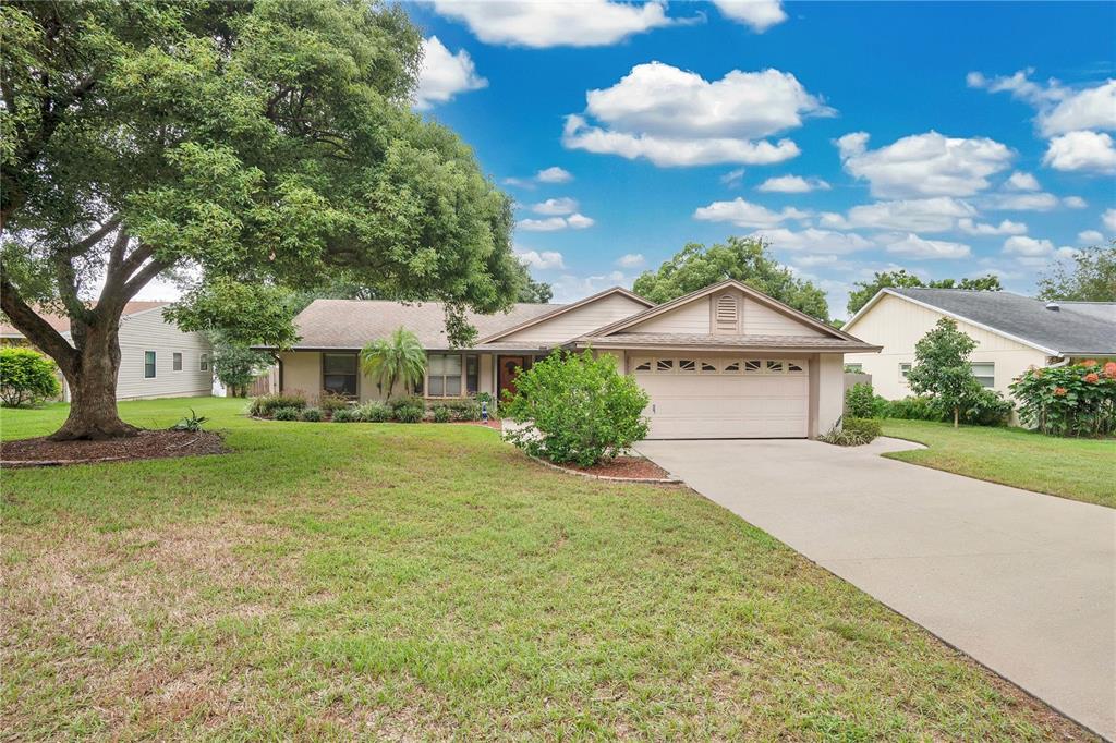 a front view of a house with yard