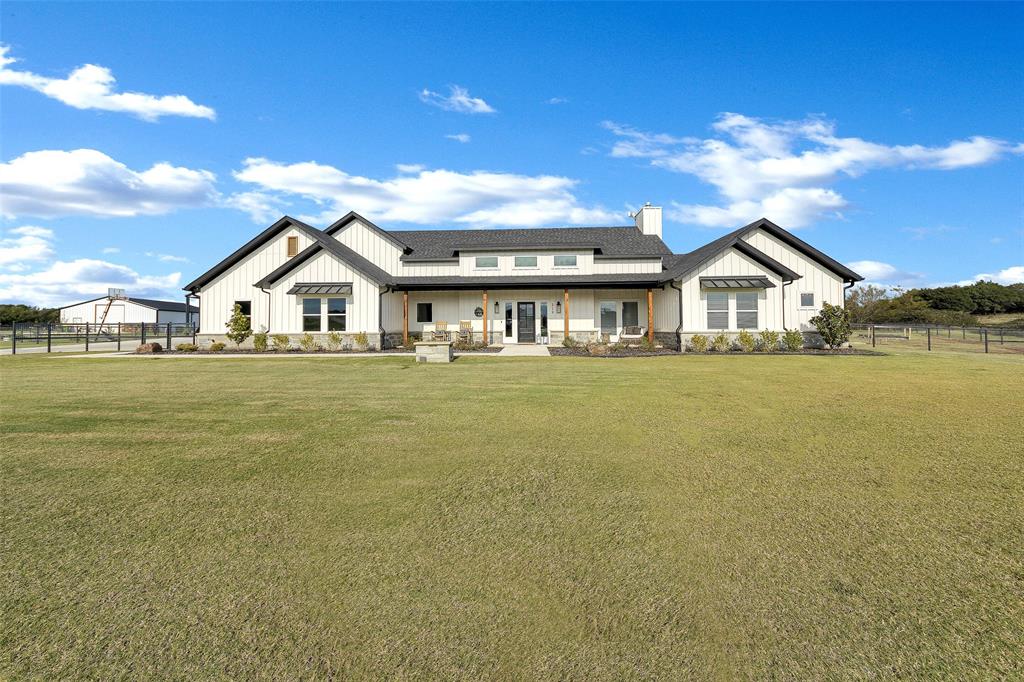 a view of a house with a ocean view