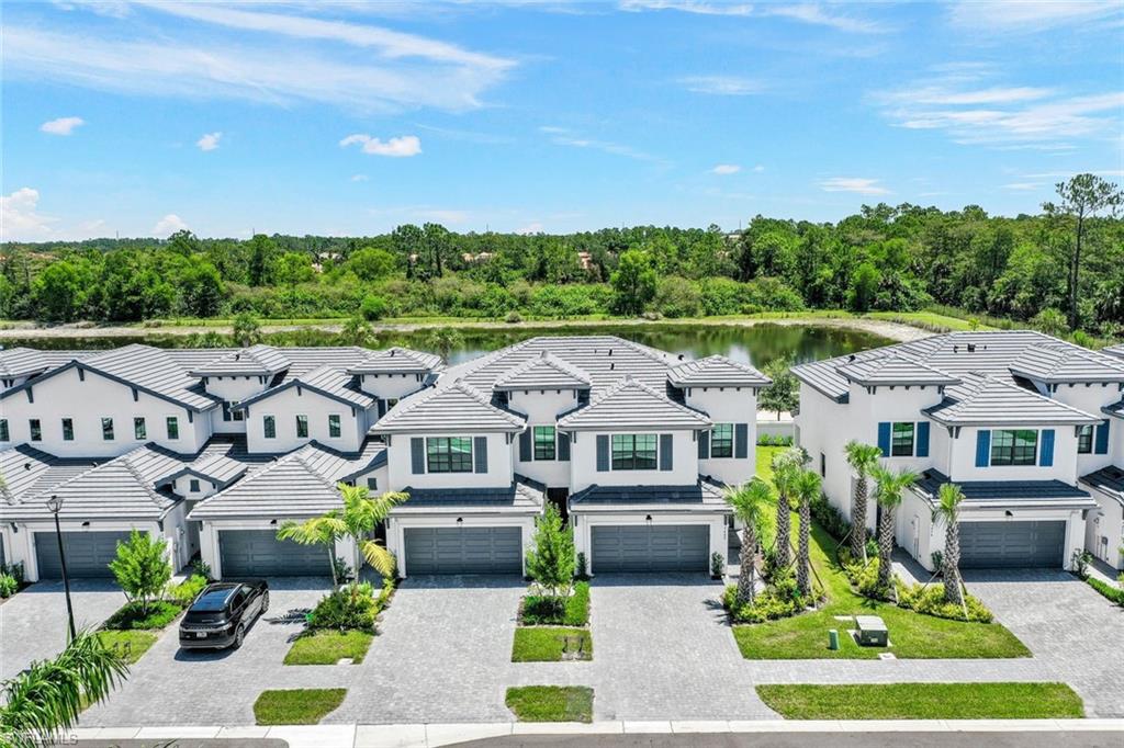 a aerial view of a house with a yard