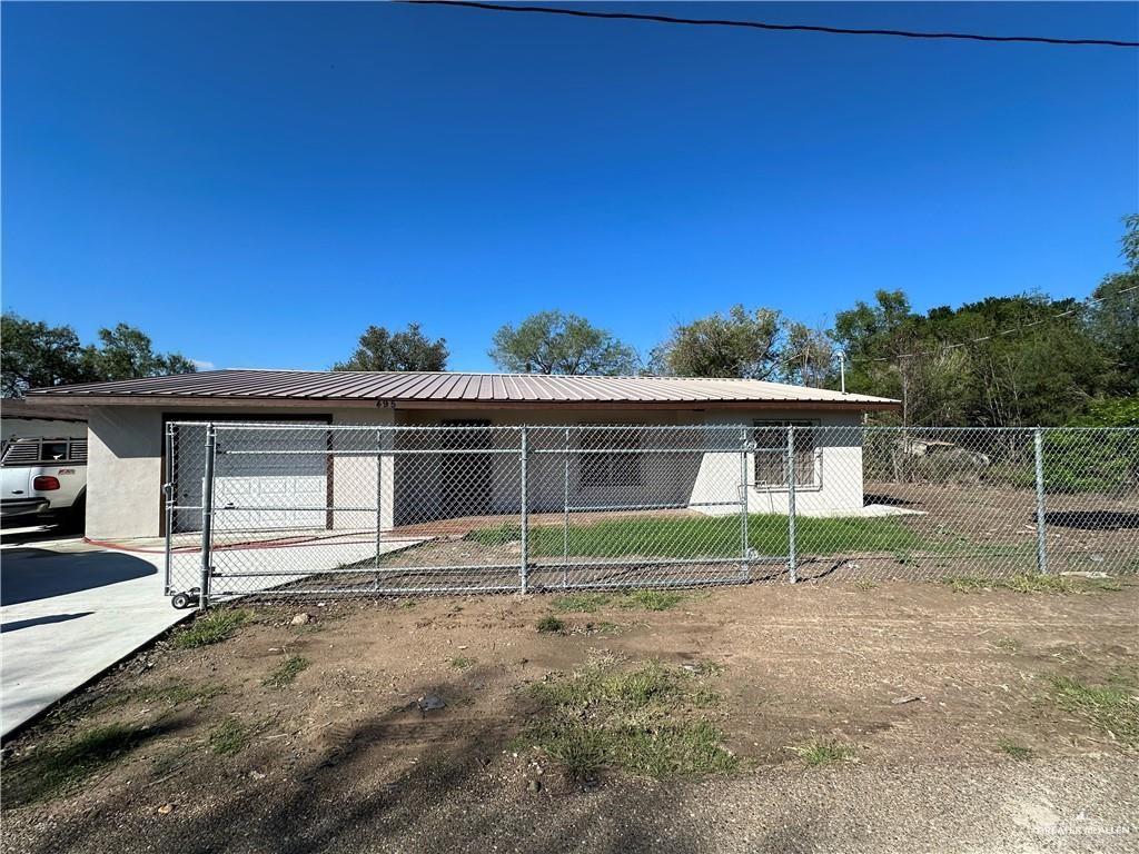 front view of house with a yard