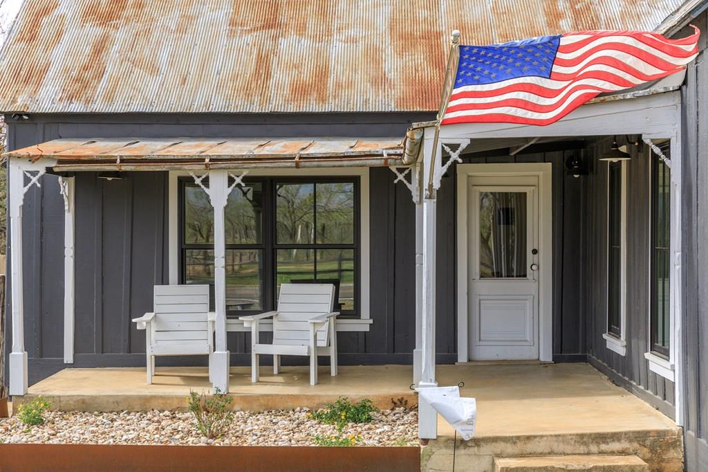 a front view of a house with a porch