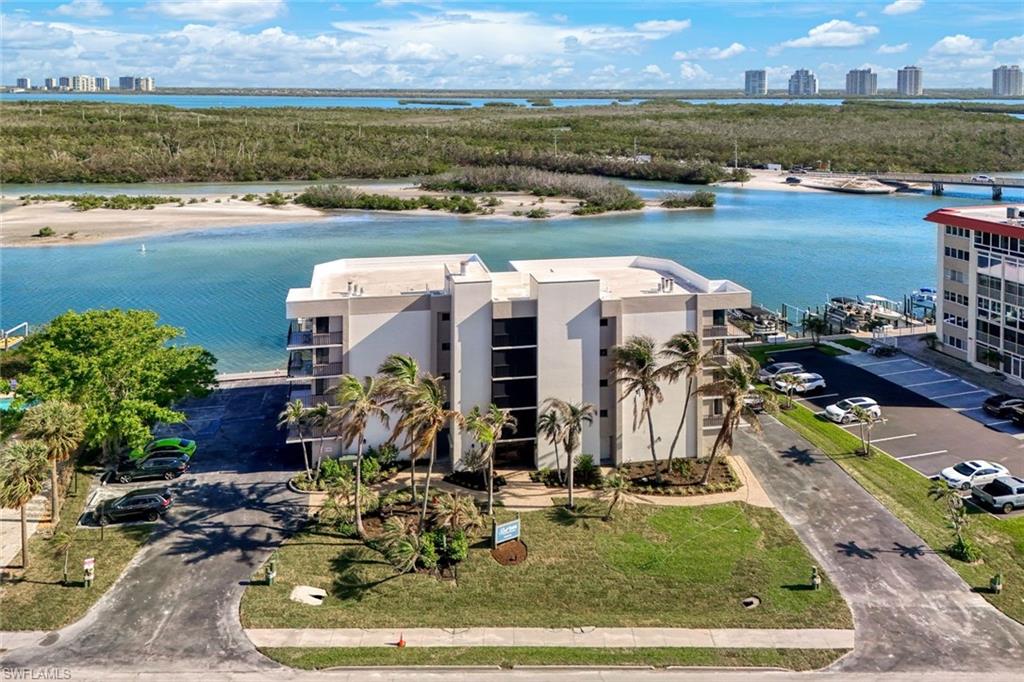 Gulf Harbor Aerial view.  This low density building offers spacious condo living ideally situated on the Bay on the quiet north end of Little Hickory Island, home of Beautiful Bonita Beach!