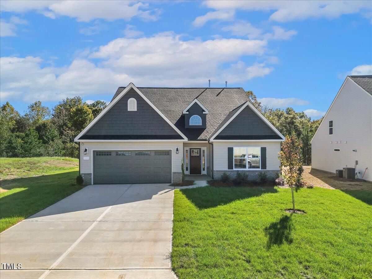 front view of house with a yard