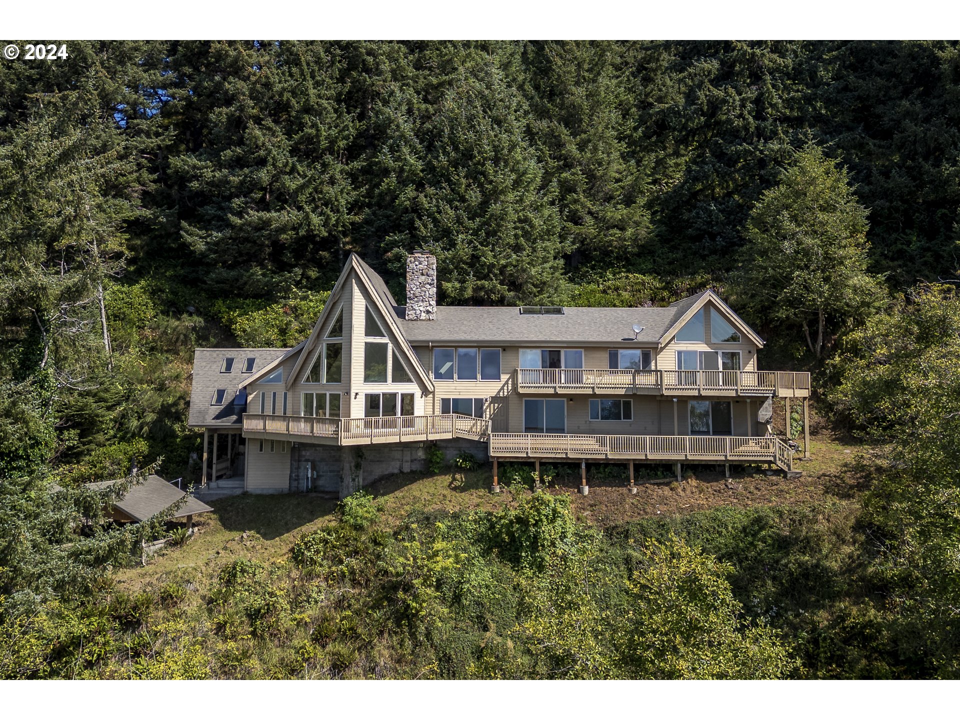 a house with trees in the background