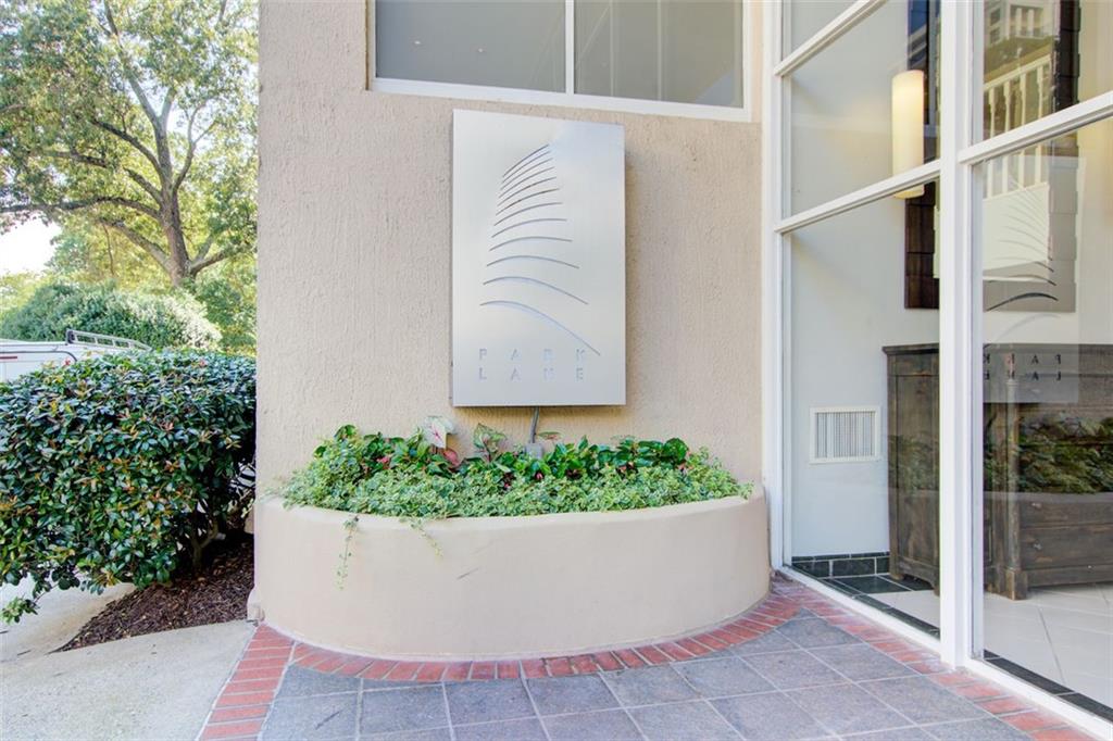 a view of a house with a potted plant