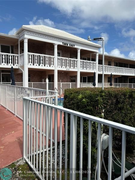 a front view of multi story residential apartment building