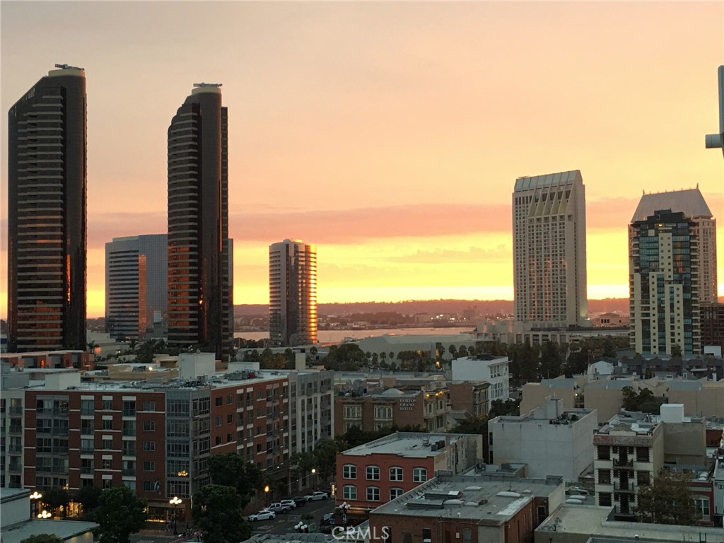 a view of city with tall buildings