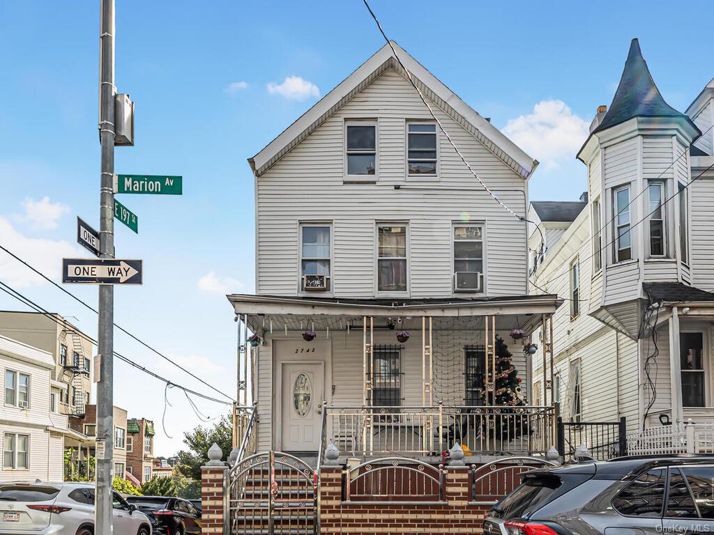 a view of a house with a street