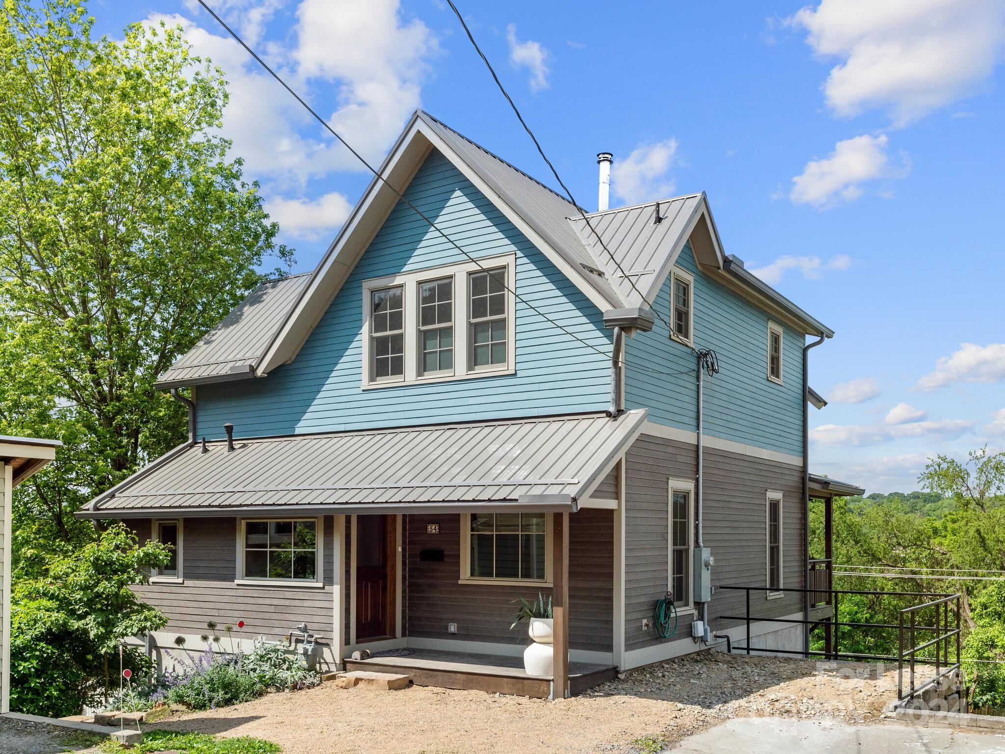 a front view of a house with a porch