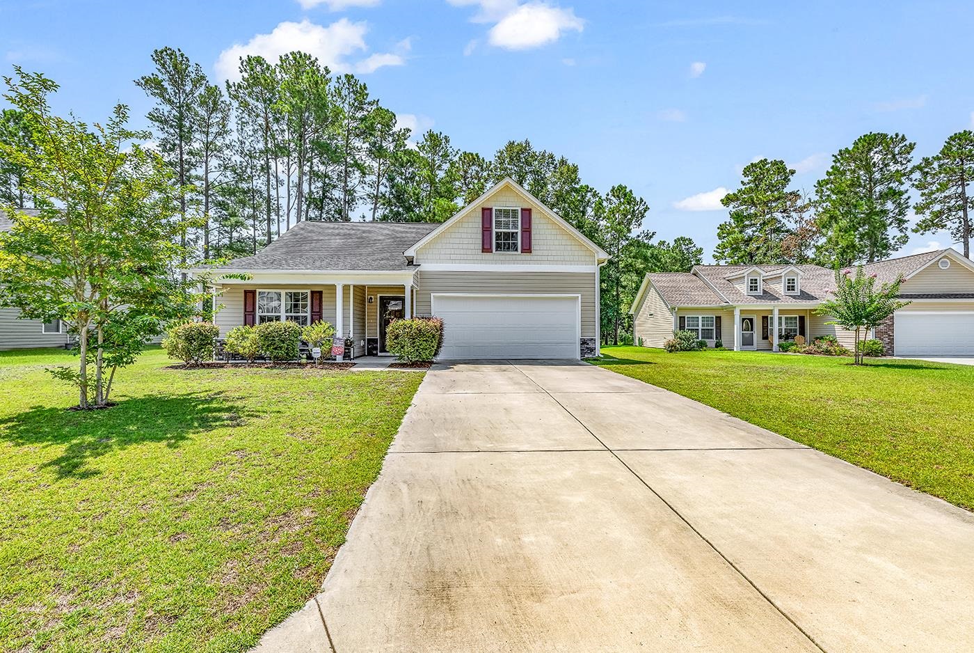 View of front property featuring a front lawn