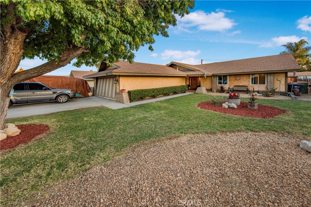 front view of a house with a yard