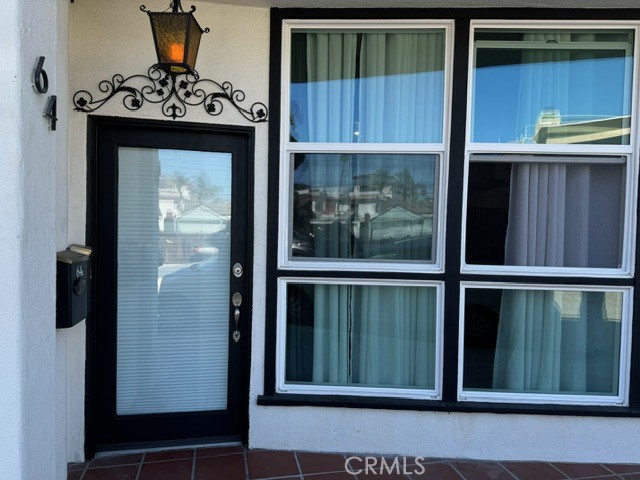 a window with red door