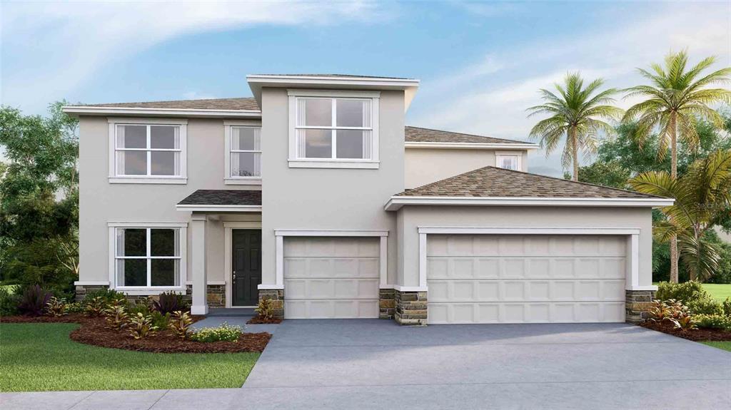 a front view of a house with a yard and garage