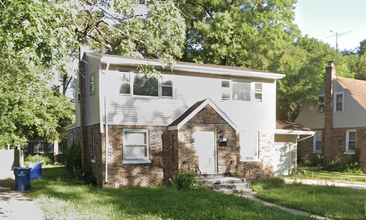 a front view of house with yard