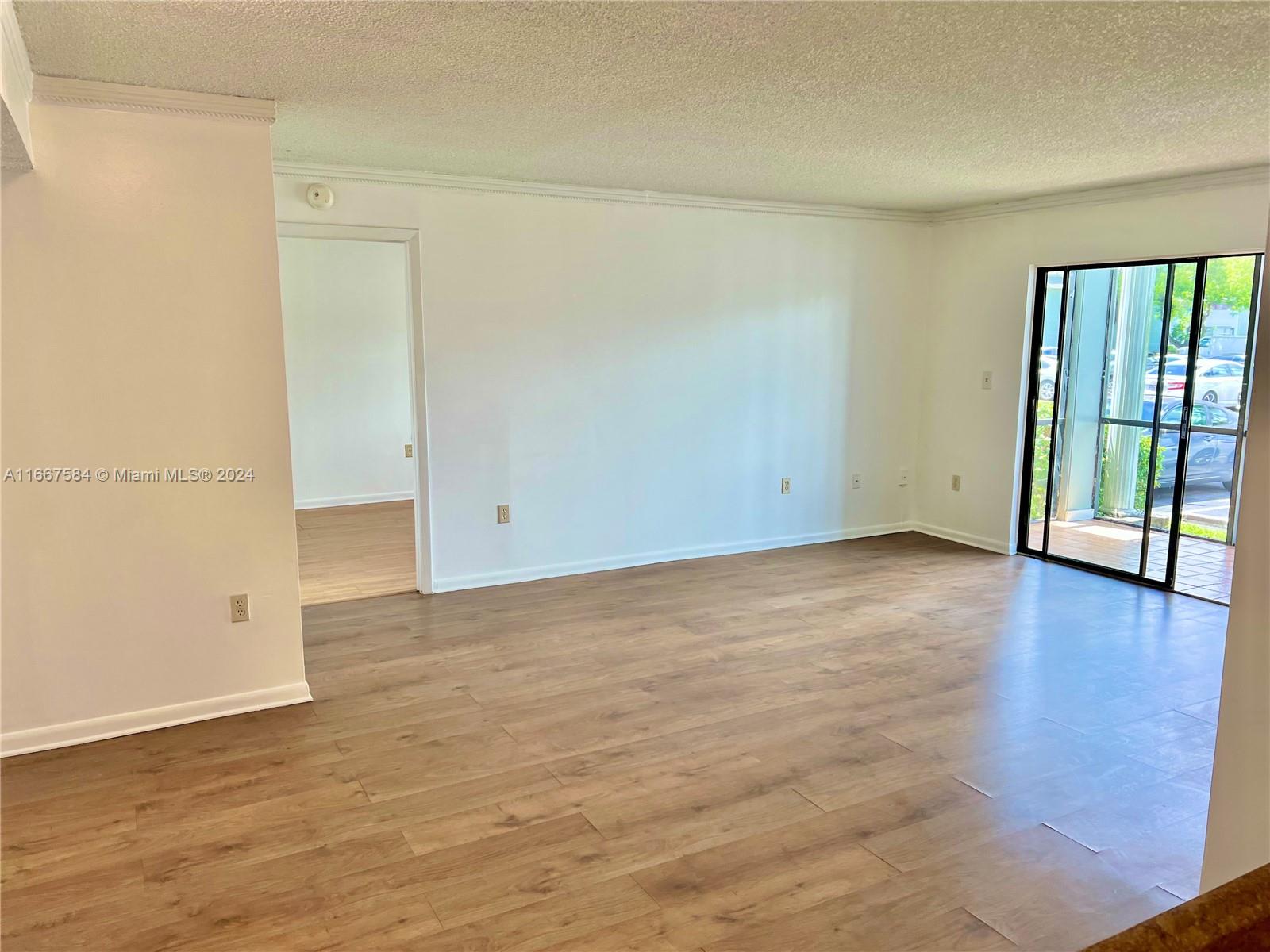 a view of an empty room with window