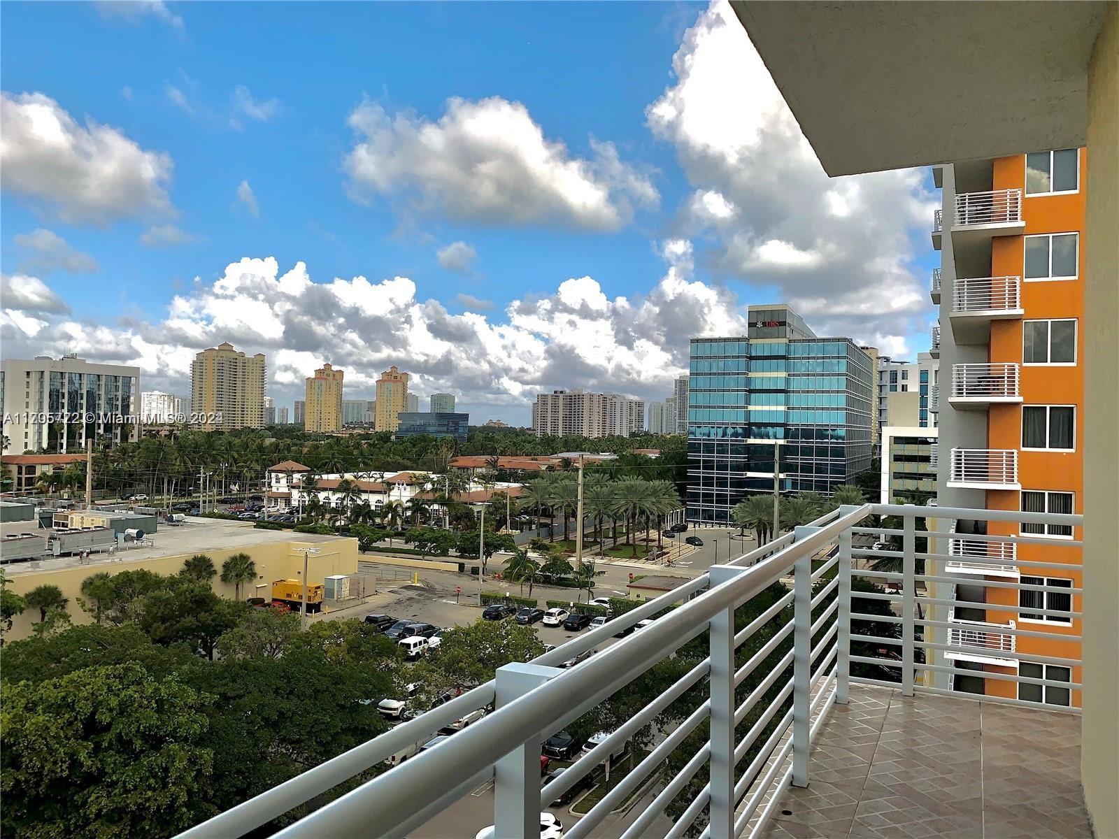 a city view from a balcony