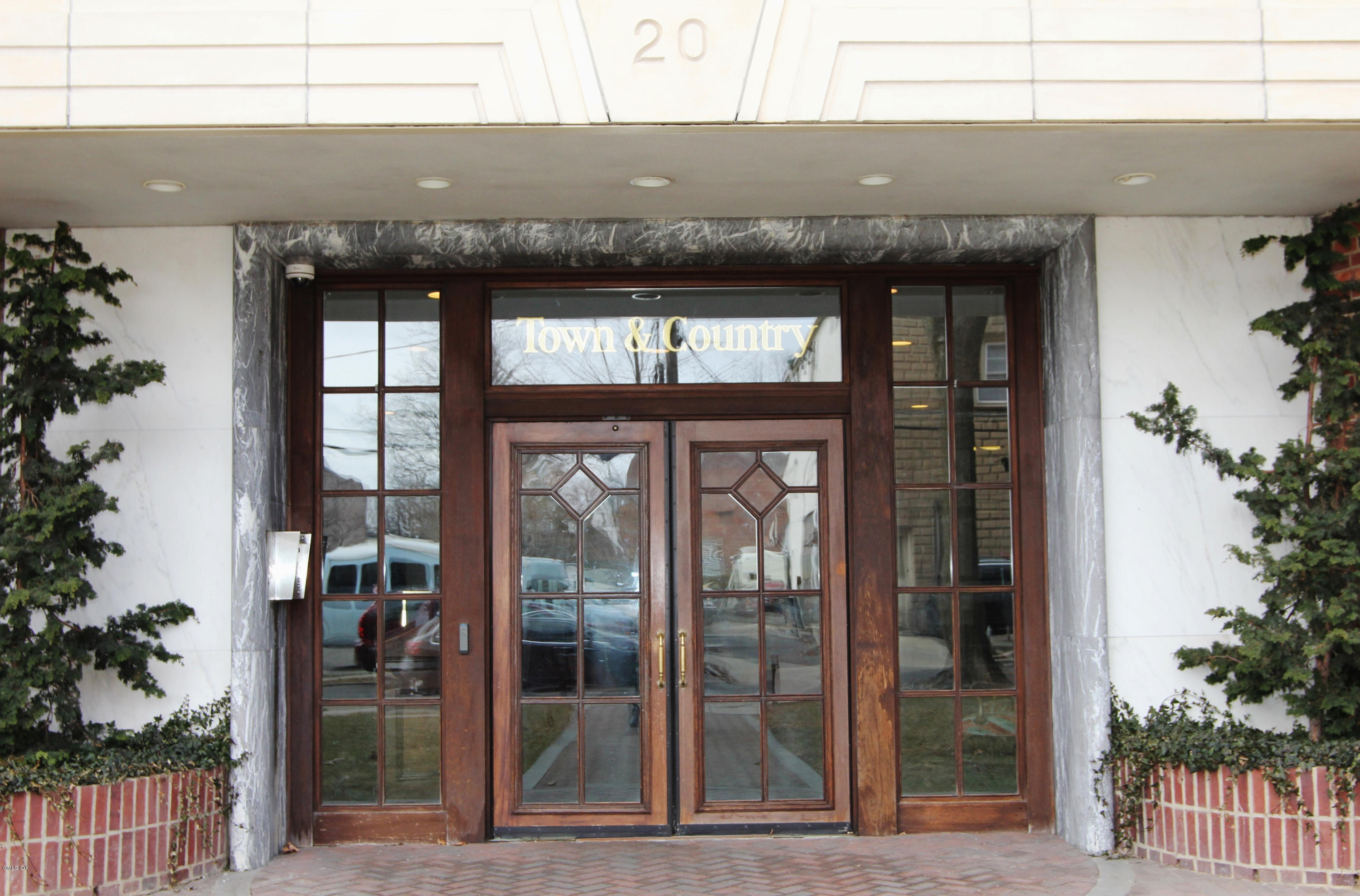 a view of a brick building and front door