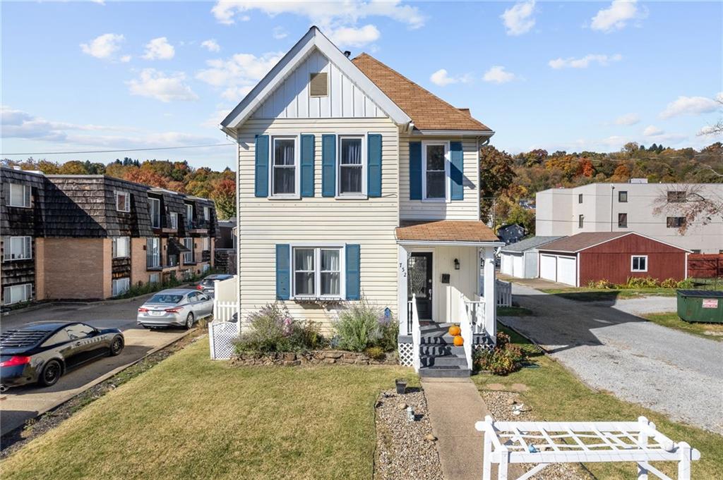 a view of a front of a house with a patio