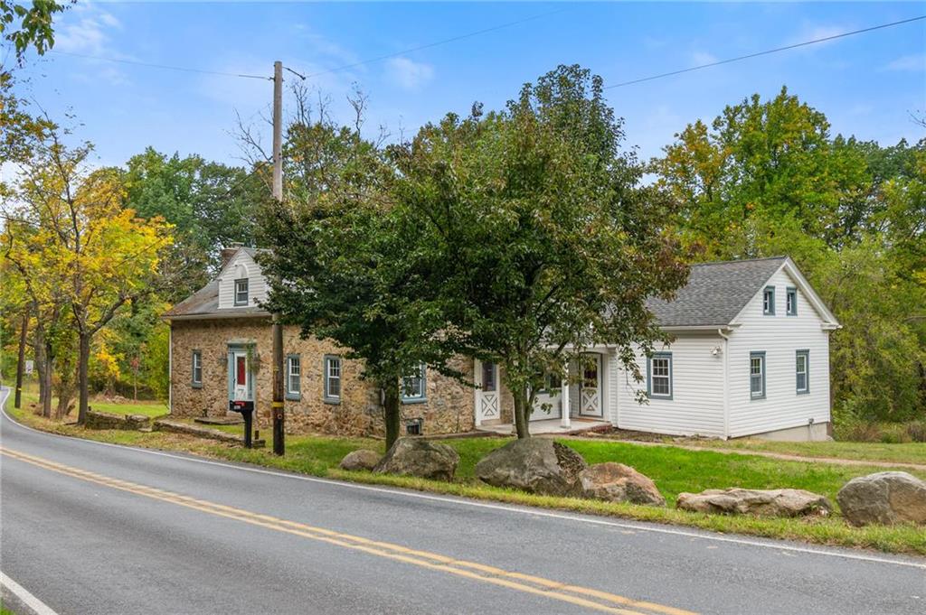 front view of a house with a small yard