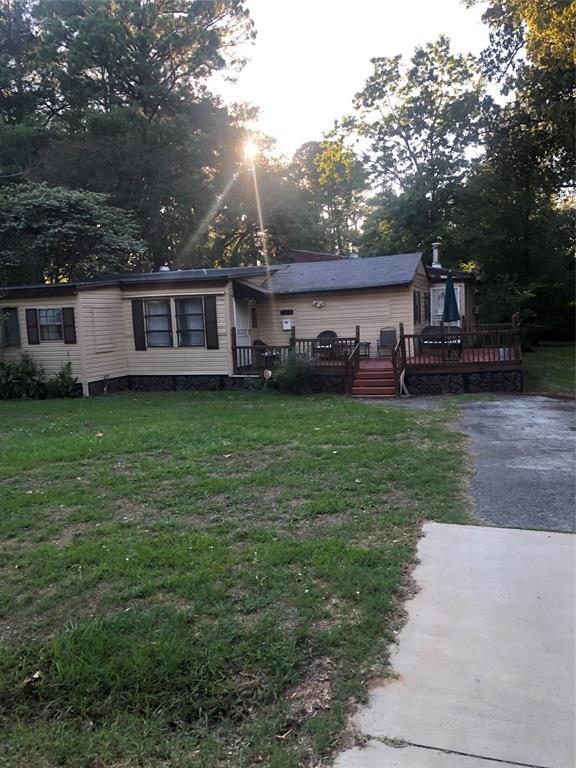 a view of a yard in front of a house