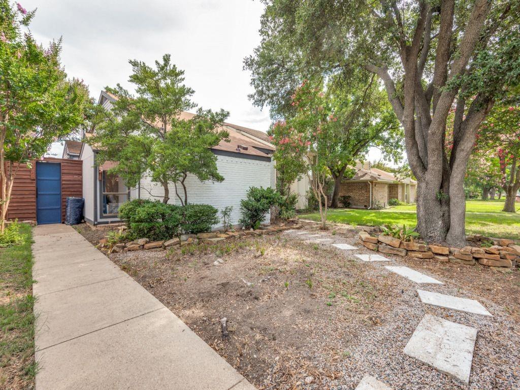 a house with trees in front of it