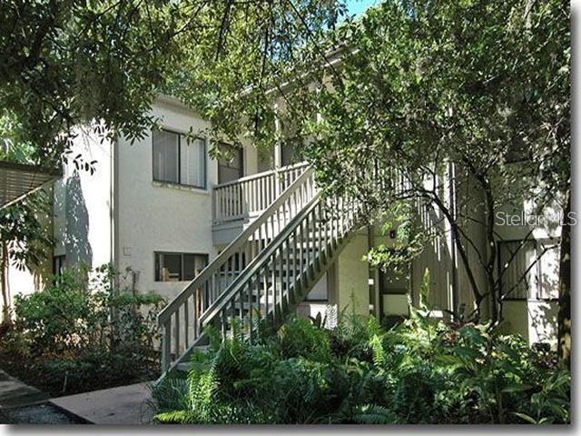 a balcony with plants