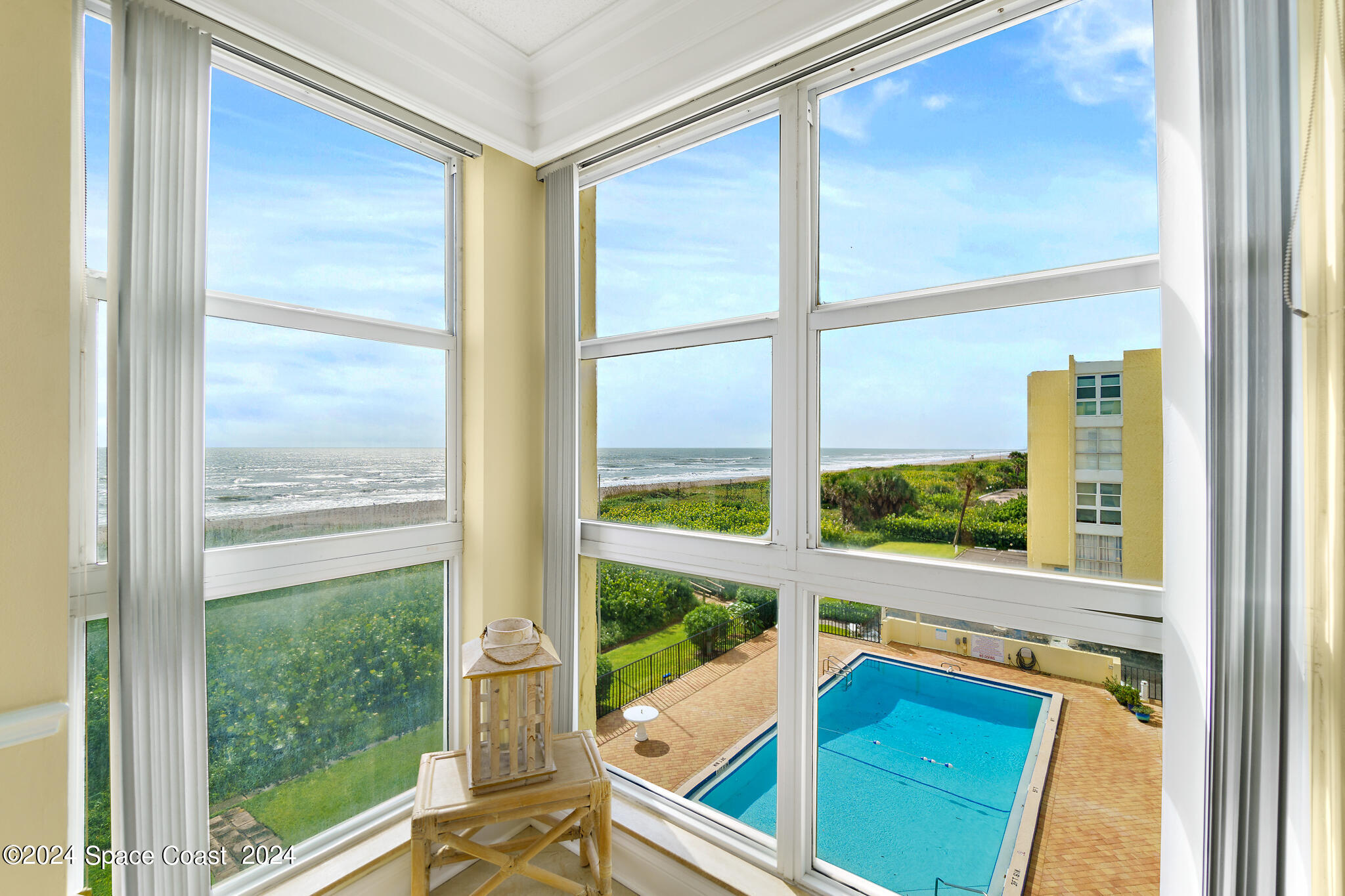 a view of a balcony with an outdoor space