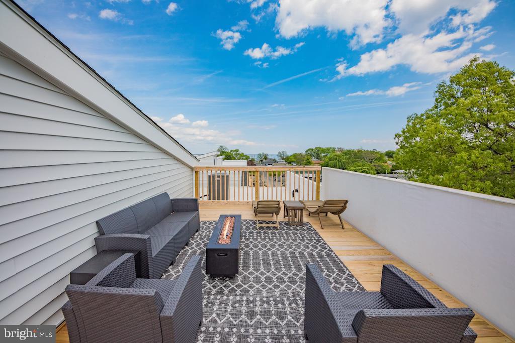 a view of balcony with furniture