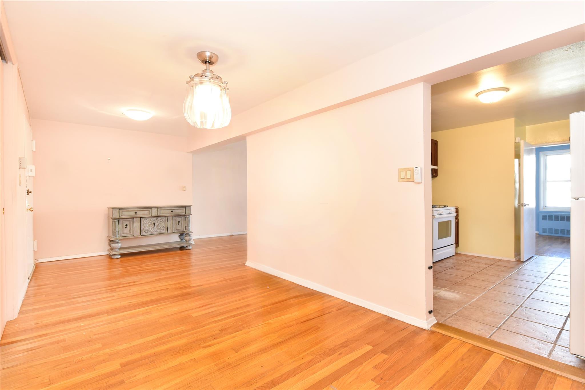 Empty room featuring hardwood / wood-style floors