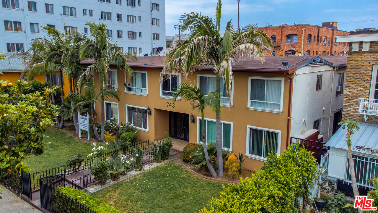 a front view of a multi story residential apartment building