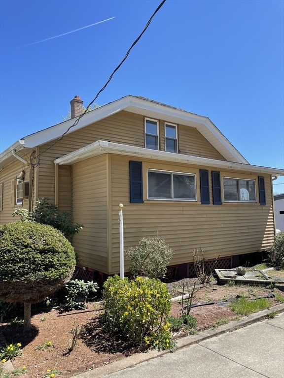 a front view of a house with yard