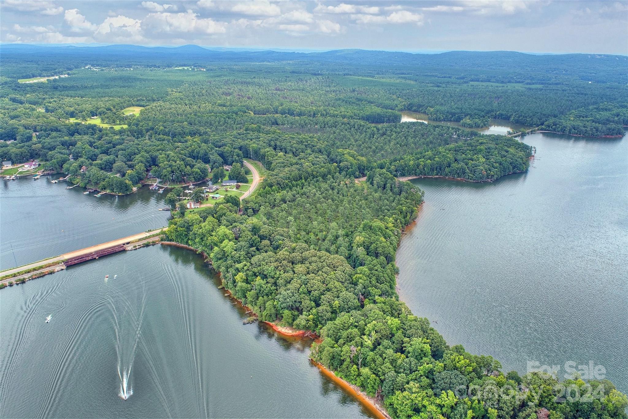 a view of a lake with a city