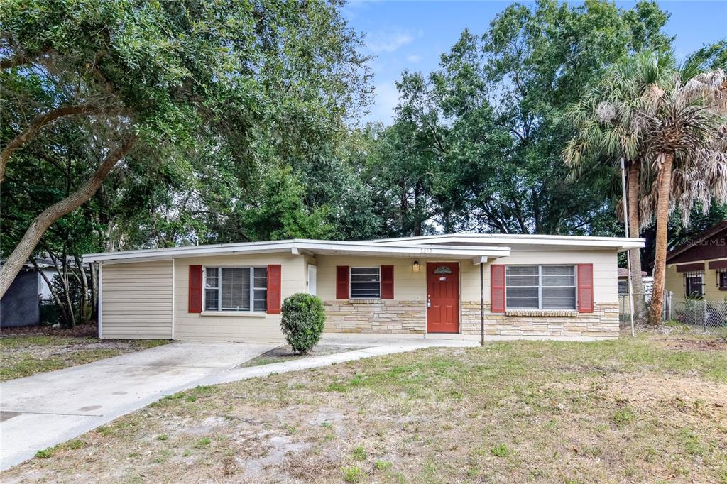 front view of a house with a yard