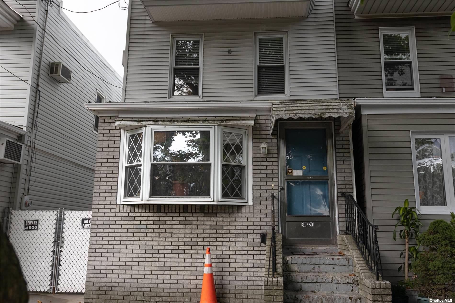 a front view of a house with a porch