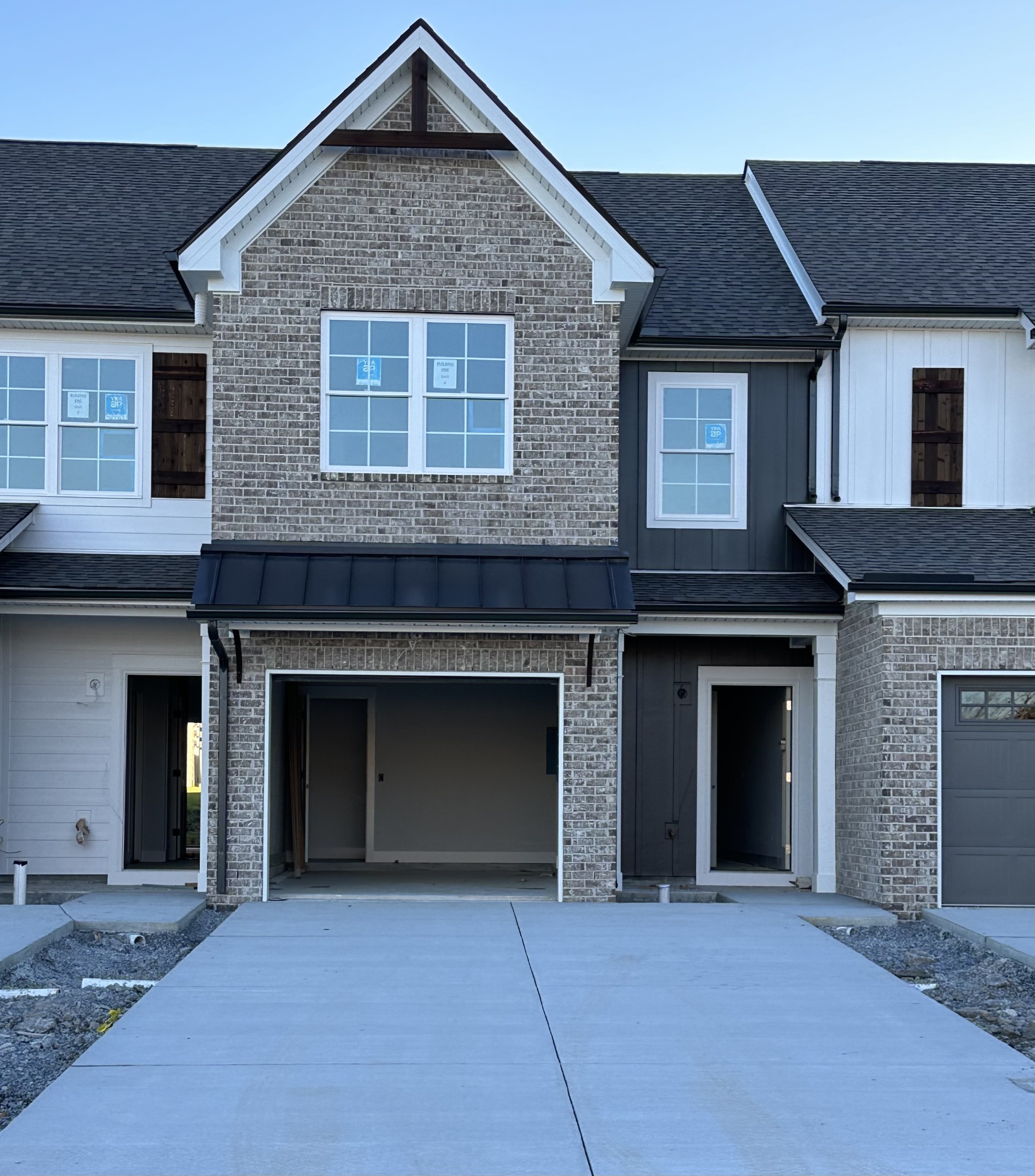 a front view of a house with yard