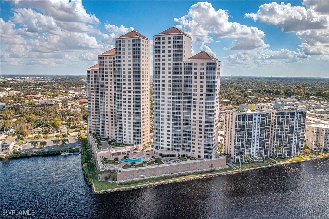 a front view of a building with lake view