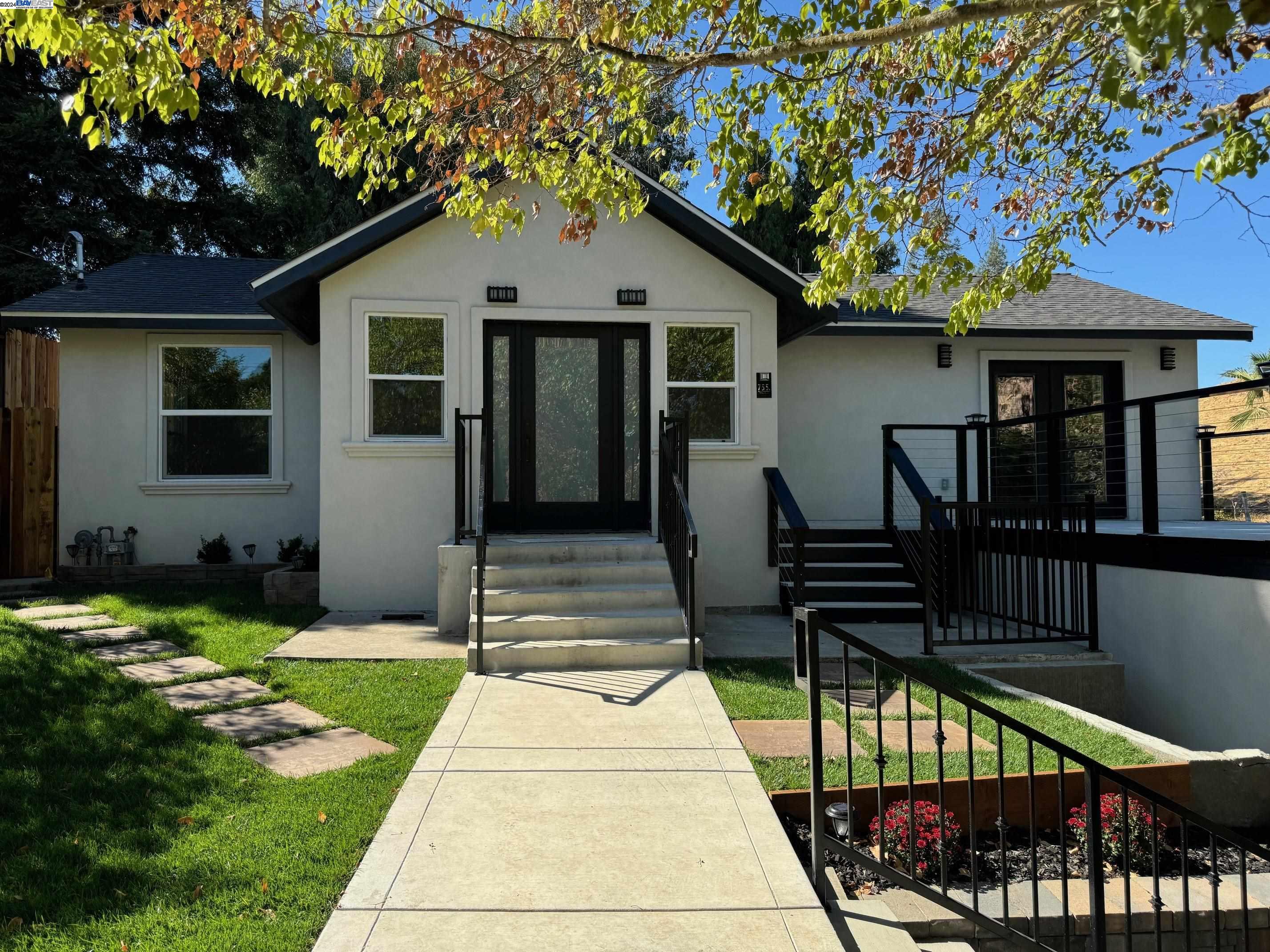 a front view of house with yard