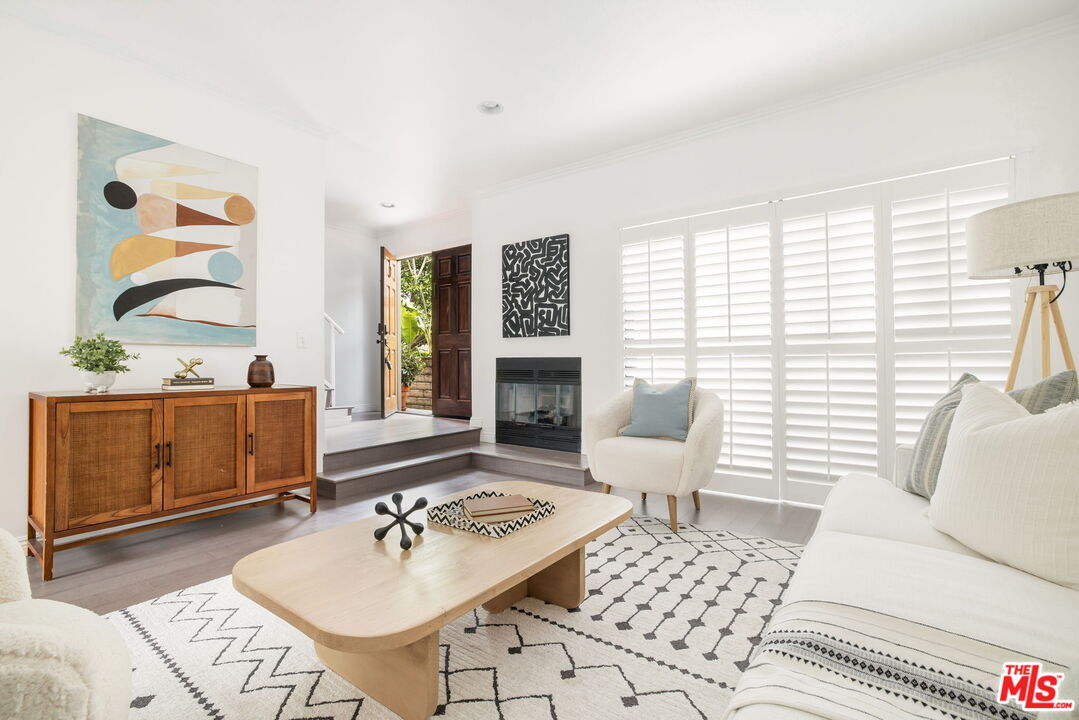 a living room with furniture and window