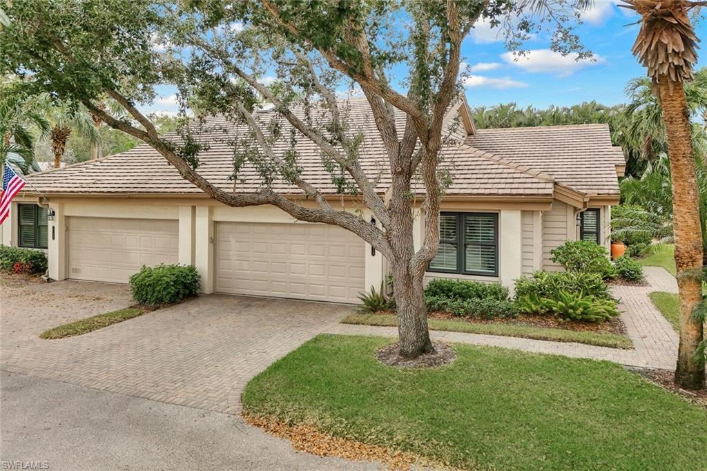 Single story home with a garage