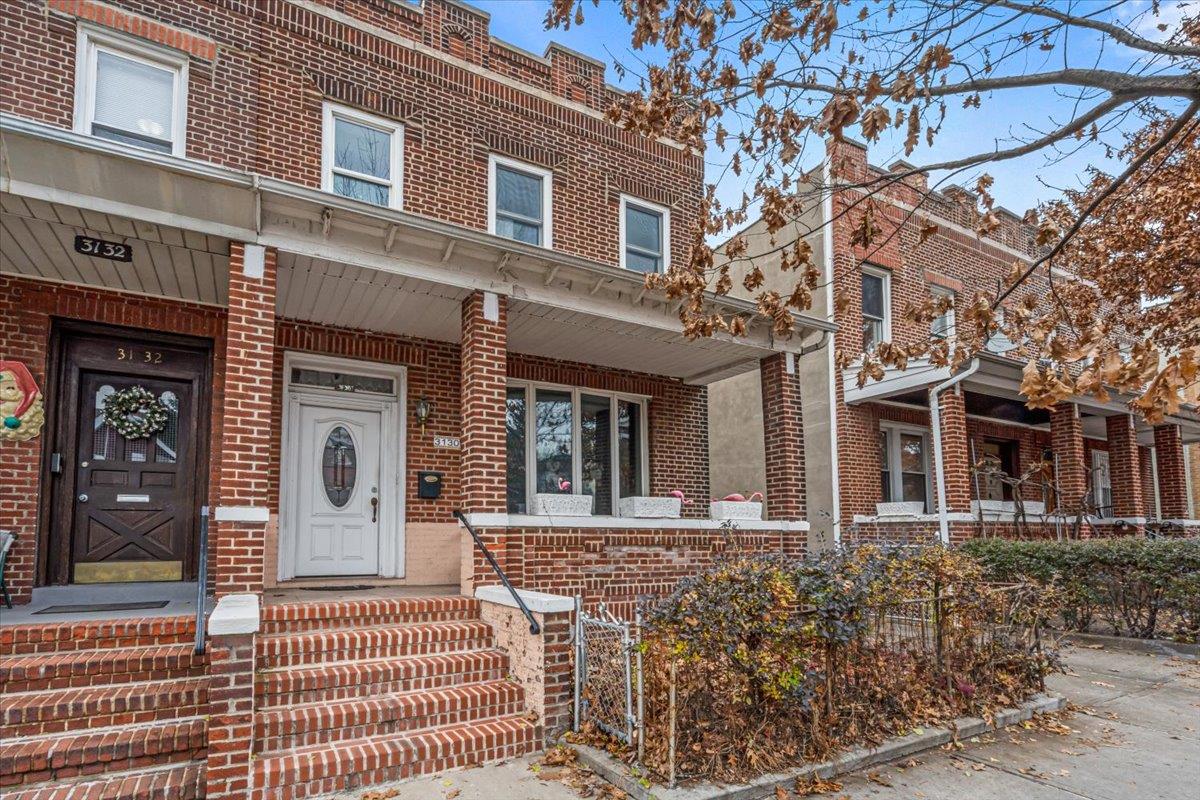 Multi unit property featuring a porch