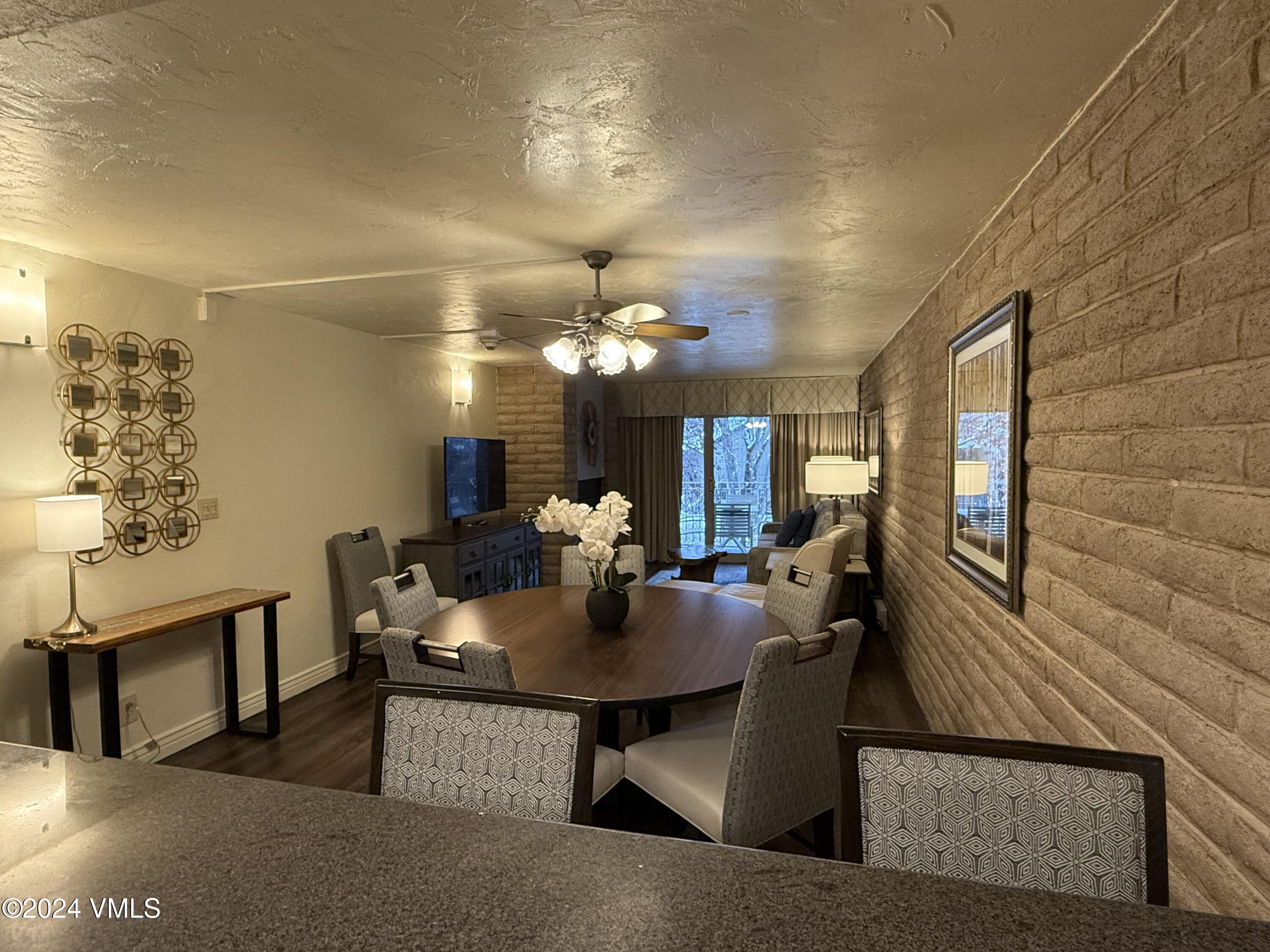 a view of a dining room with furniture