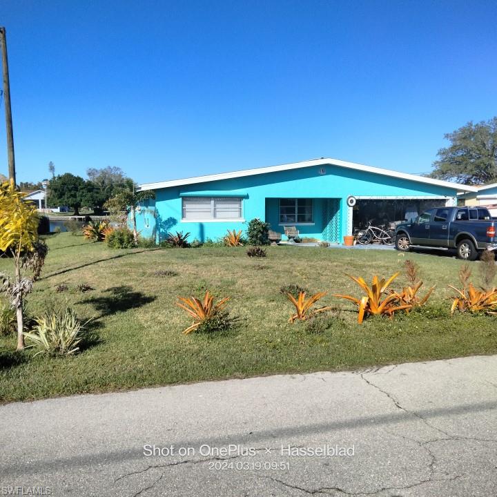 a view of a yard with patio