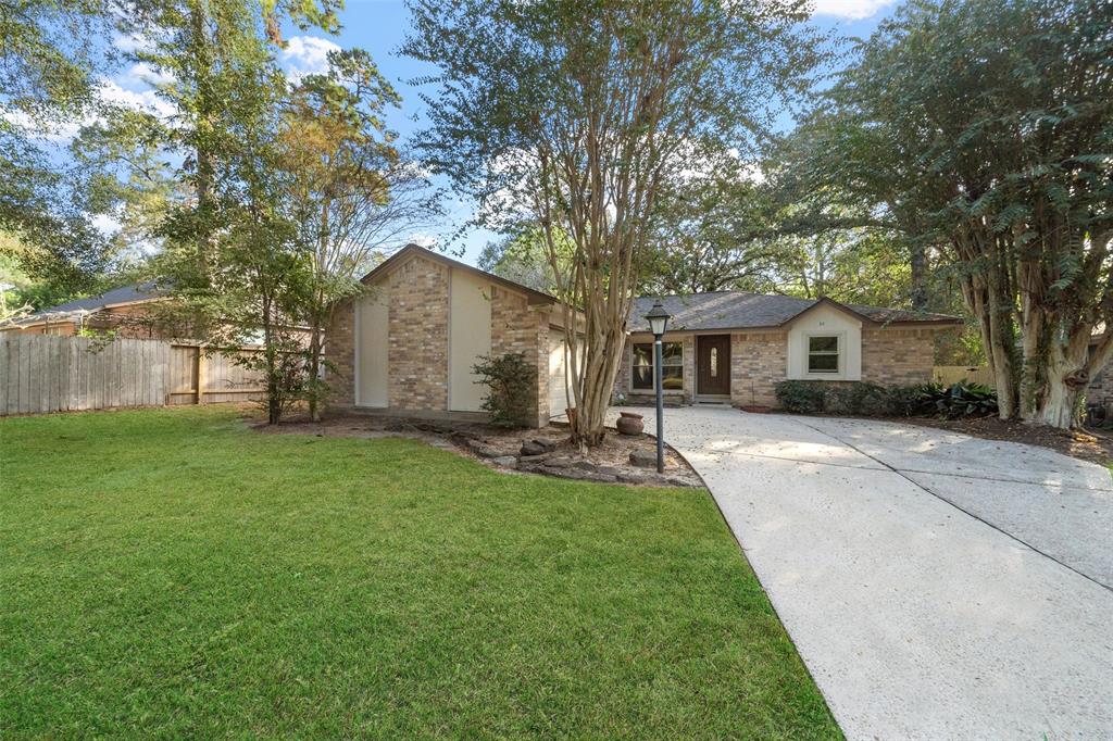 a front view of house with yard patio and green space