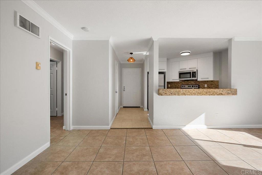 a view of a kitchen with a sink