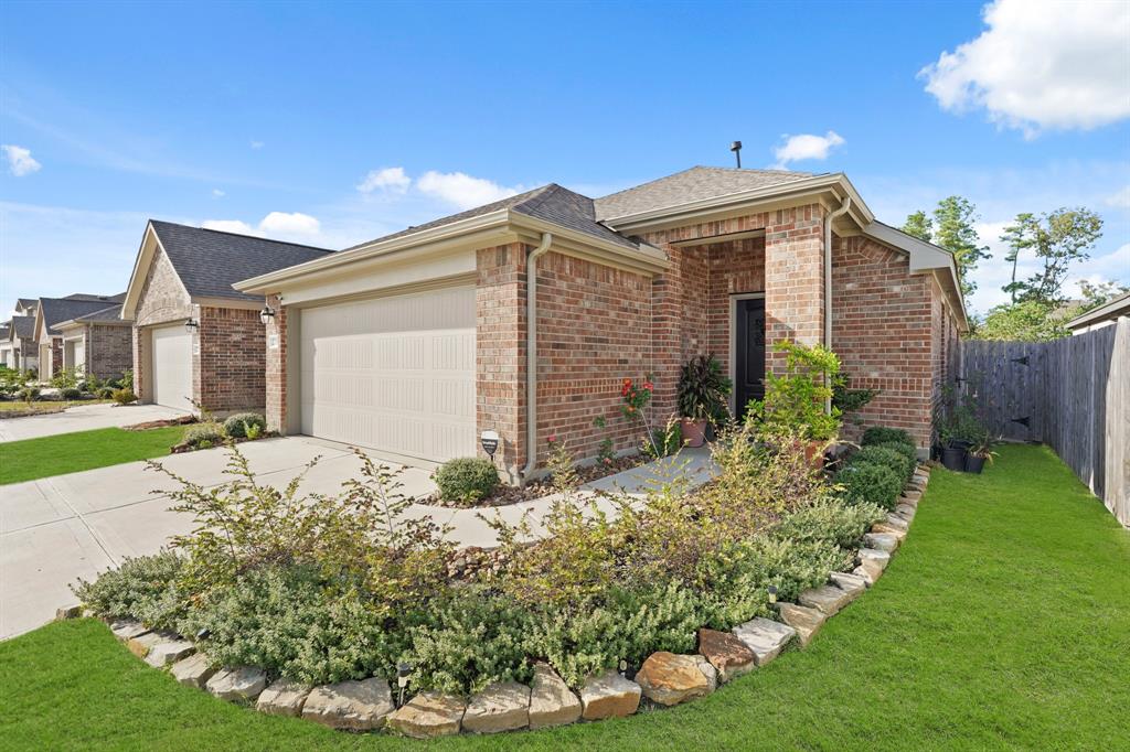 a front view of house with garden