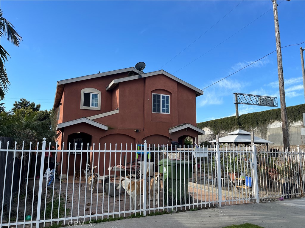 a front view of house yard and deck