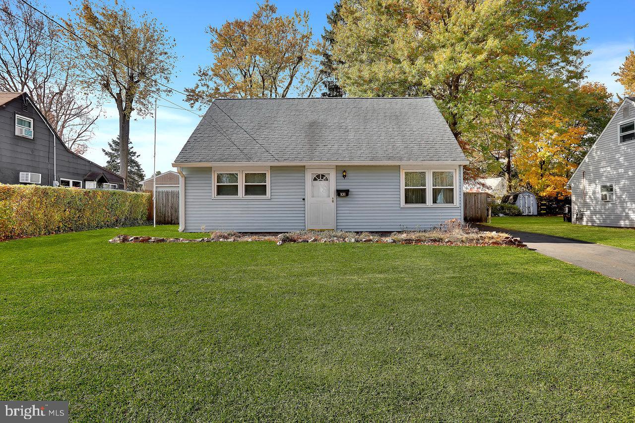 front view of house with a yard