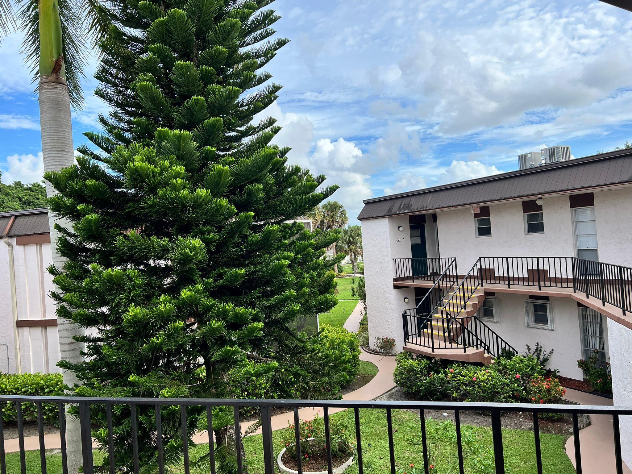 a front view of a house with patio