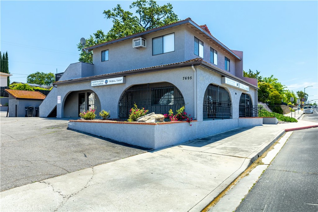 a front view of house with outdoor space