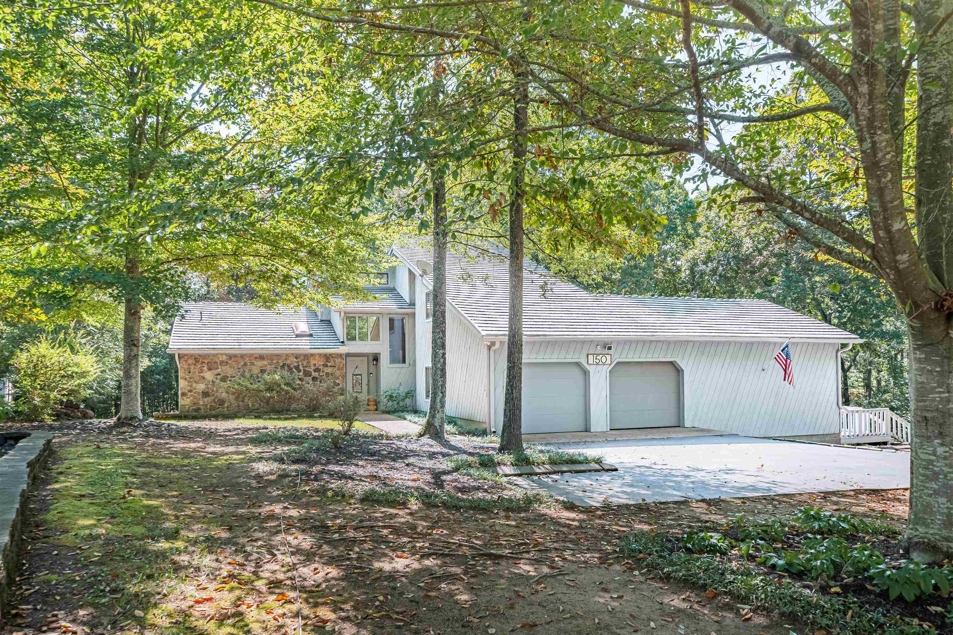 front view of a house with a dry yard